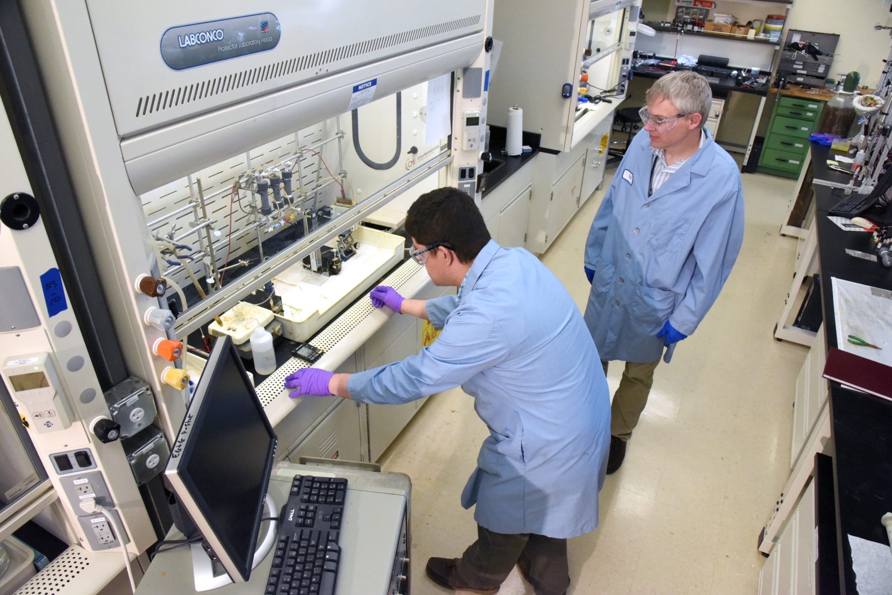 two researchers work in a laboratory