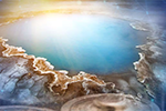 This composite image from Idaho National Laboratory shows geothermal water and batteries, representing CMI research at INL that lithium from geothermal brine could help meet growing demand for raw material and make geothermal power more cost efficient. 