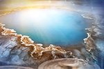 This composite image from Idaho National Laboratory shows geothermal water and batteries, representing CMI research at INL that lithium from geothermal brine could help meet growing demand for raw material and make geothermal power more cost efficient.