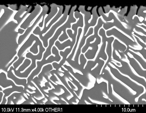 SEM image of Al-10Ce intergranular attack. Al11Ce3 acts to cathodically protect aluminum matrix