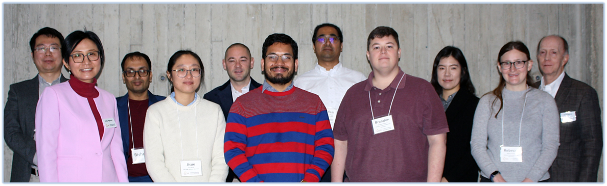 group of people standing in two rows