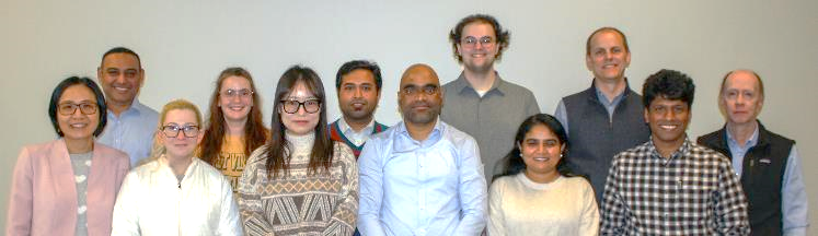 image of group of people standing in two rows