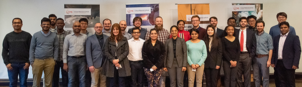 group of people standing in front of banners are the early career presenters for the CMI Winter Meeting 2023