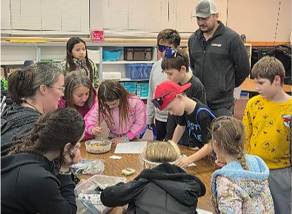 Students participated in the new bird seed material separation activity.