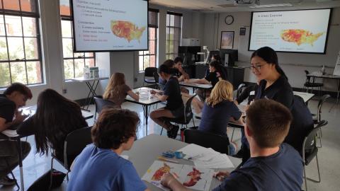image of classroom with students and CMI Deputy Focus Area Lead Hongyue Jin, University of Arizona