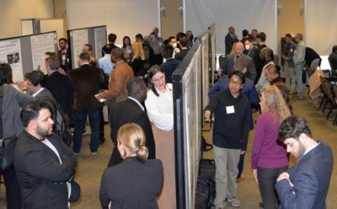 People at the poster presentation session of the CMI Winter Meeting hosted by Colorado School of Mines, March 2022.