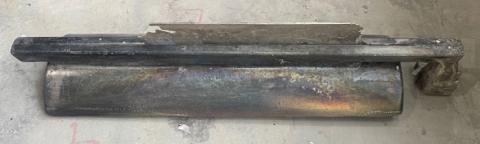 Top: Mg-Nd ingot produced by calciothermic reduction of the chloride to produce >50-lb batches. After reduction, samples are refined by distillation and arc melting to produce neodymium metal with low oxygen content for use in magnet production. Vacuum arc melted sample, bottom, demonstrated <1500 ppm oxygen.