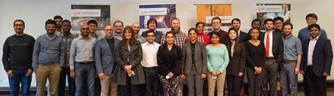 group of people standing in front of banners are the early career presenters for the CMI Winter Meeting 2023