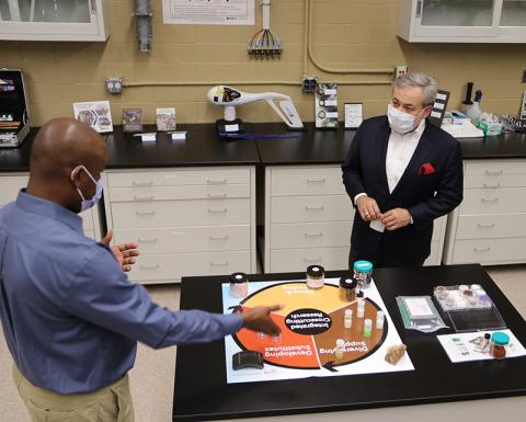 Two men in a science laboratory.