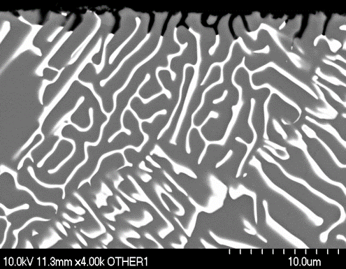 Scanning electron microscope (SEM) image of Al-10Ce intergranular attack. Al11Ce3 acts to cathodically protect aluminum matrix 