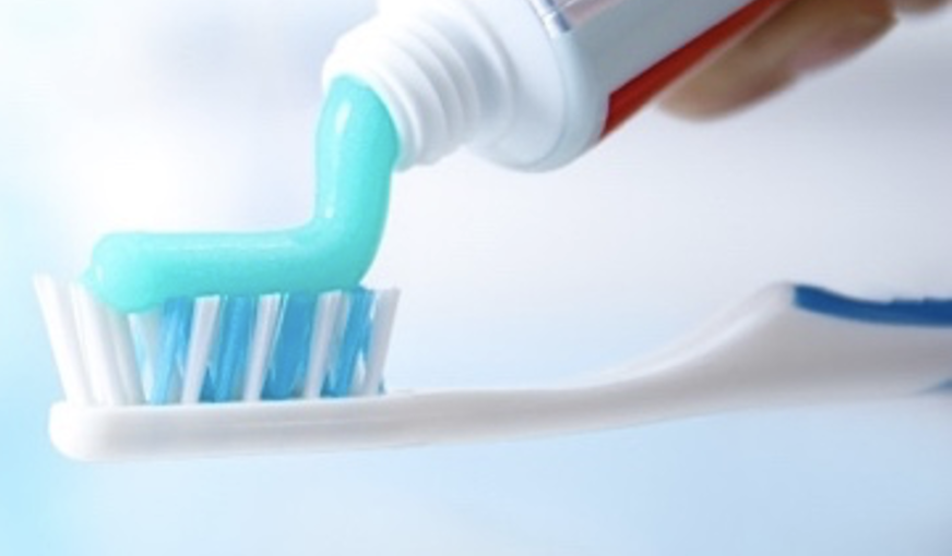 Toothpaste on a toothbrush