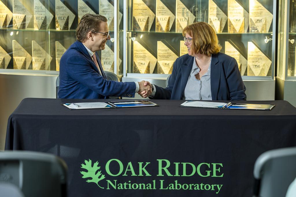 image of two people shaking hands