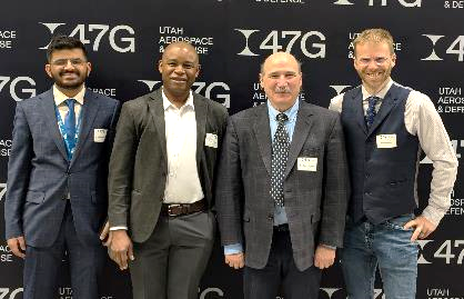 image of four people: Sameer Kulkarni, Idaho National Laboratory, Ikenna Nlebedim, Ames National Laboratory, Tom Lograsso, Ames, and Aaron Wilson, INL.