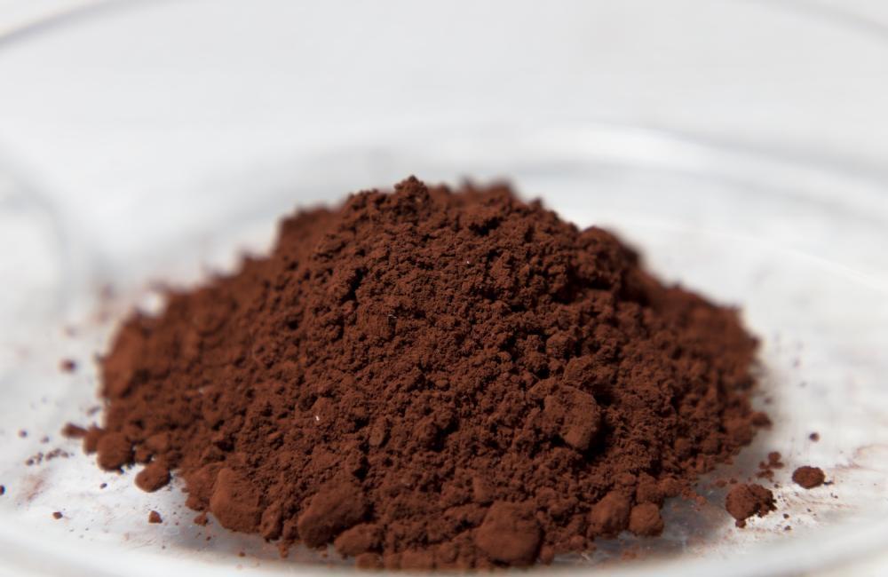 image of brown powder is a rare earth oxide recovered from scrap metal, photo credit Carlos Jones, ORNL, US Department of Energy