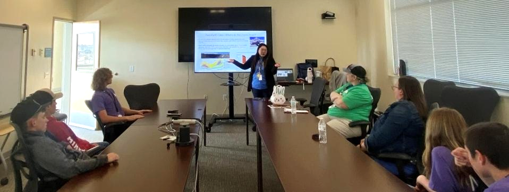 image of person presenting to a group