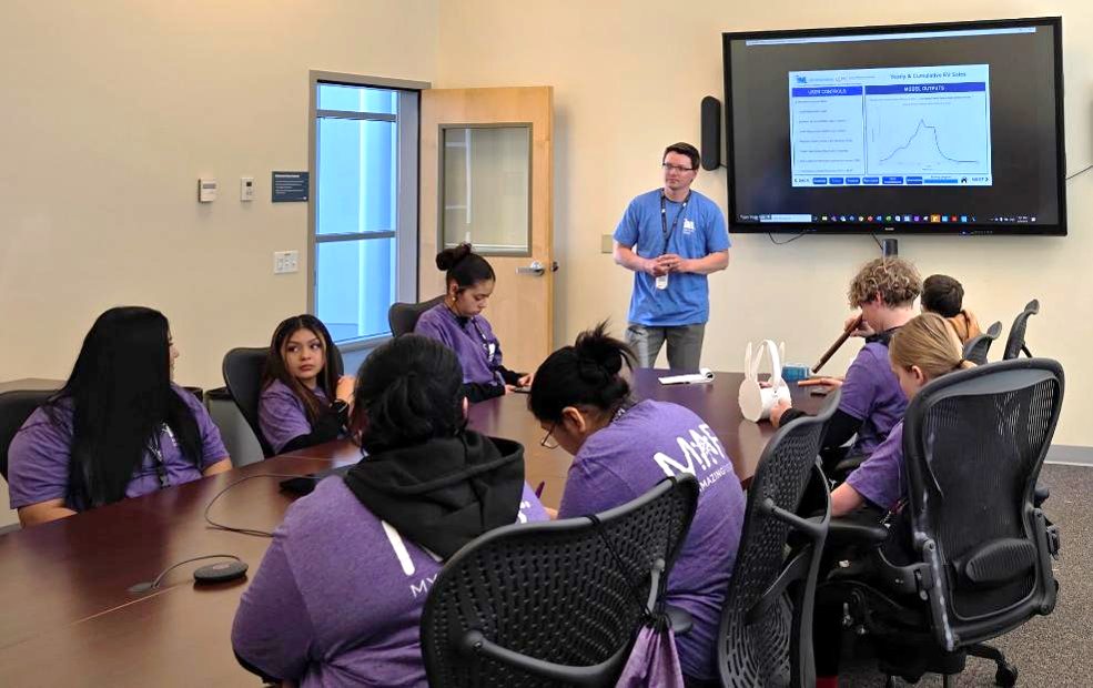 image of person presenting to a group