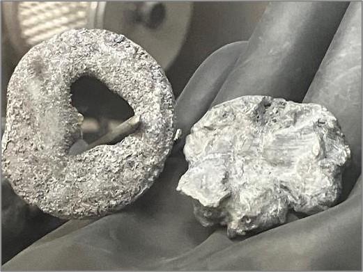 Two ~15 g Nd metal samples collected after separate feed cycles 