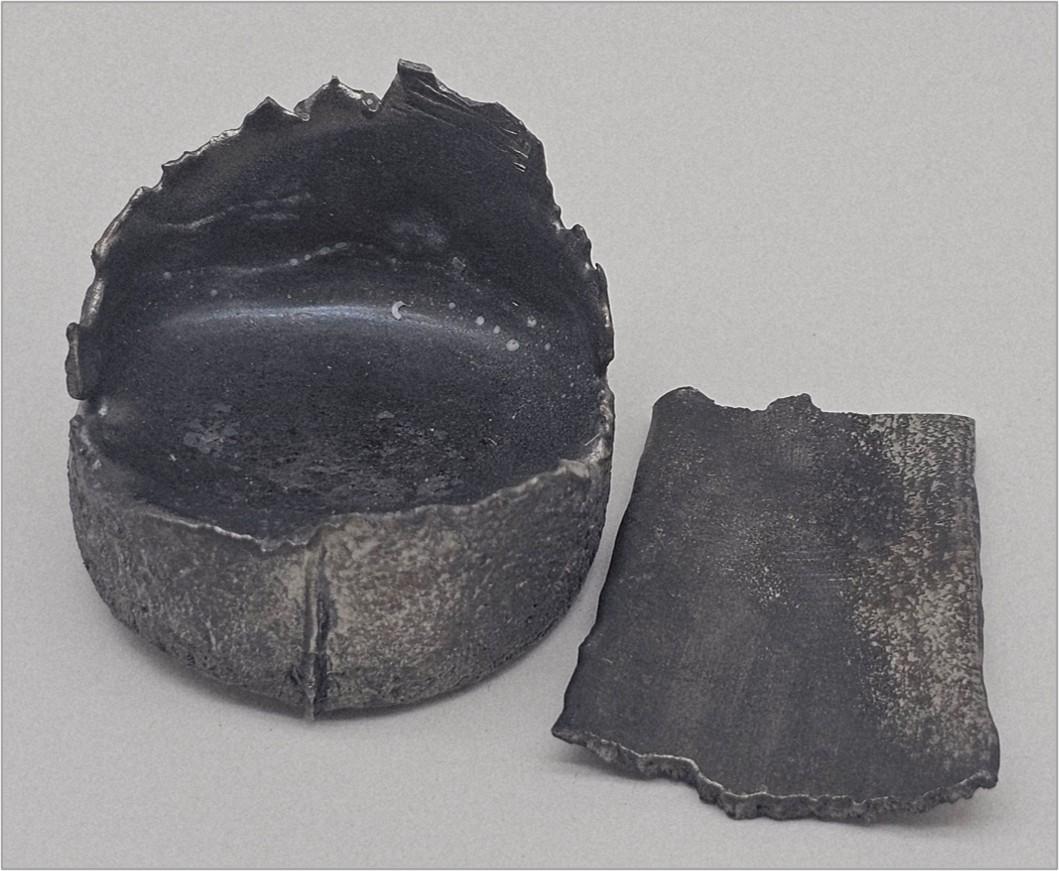Cast dysprosium metal pieces (~115g) produced via calciothermic reduction of Na‑lean dysprosium fluoride