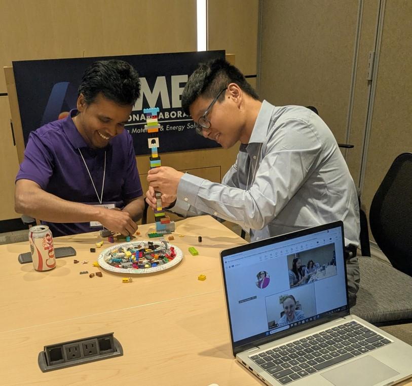 CMI LA Cohort 7 members modeling dynamic leadership in an evolving research climate through a LEGO®  brick building challenge. 