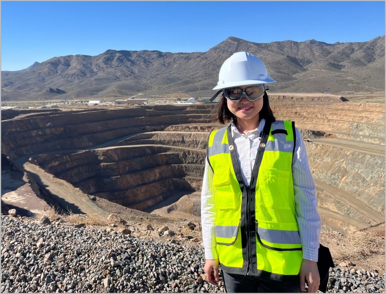 person stands by a mine