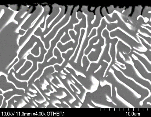 SEM image of Al-10Ce intergranular attack. Al11Ce3 acts to cathodically protect aluminum matrix 