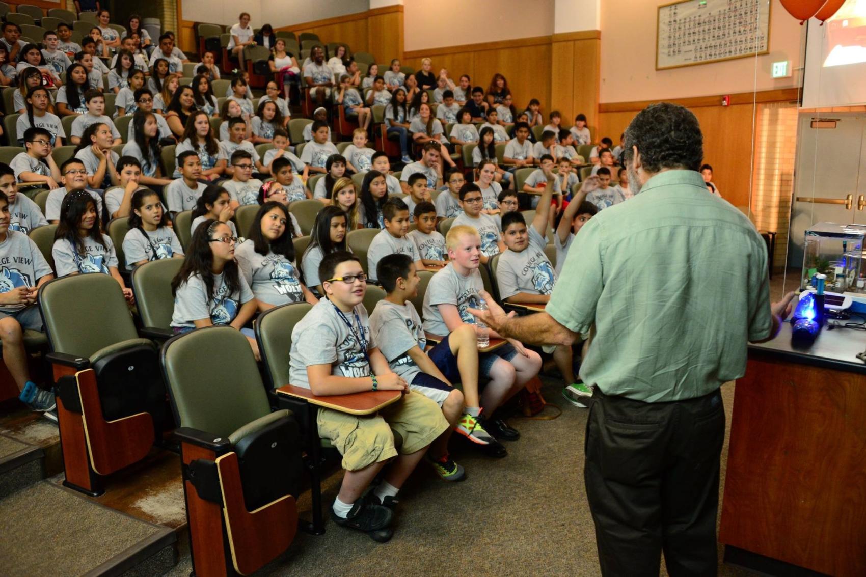 youth in college auditorium