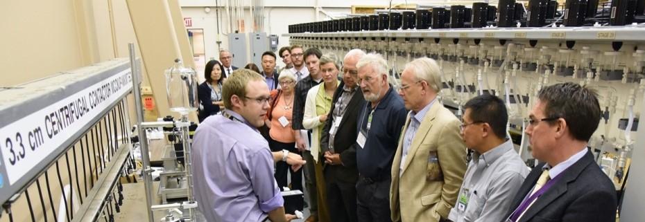 group tours the 30-stage mixer-settler at Idaho National Laboratory