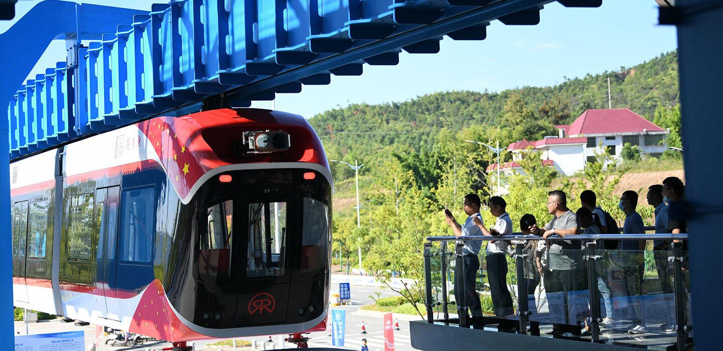 Photo of maglev train that uses magnets made from rare earth alloys to levitate train cars without consuming electricity.